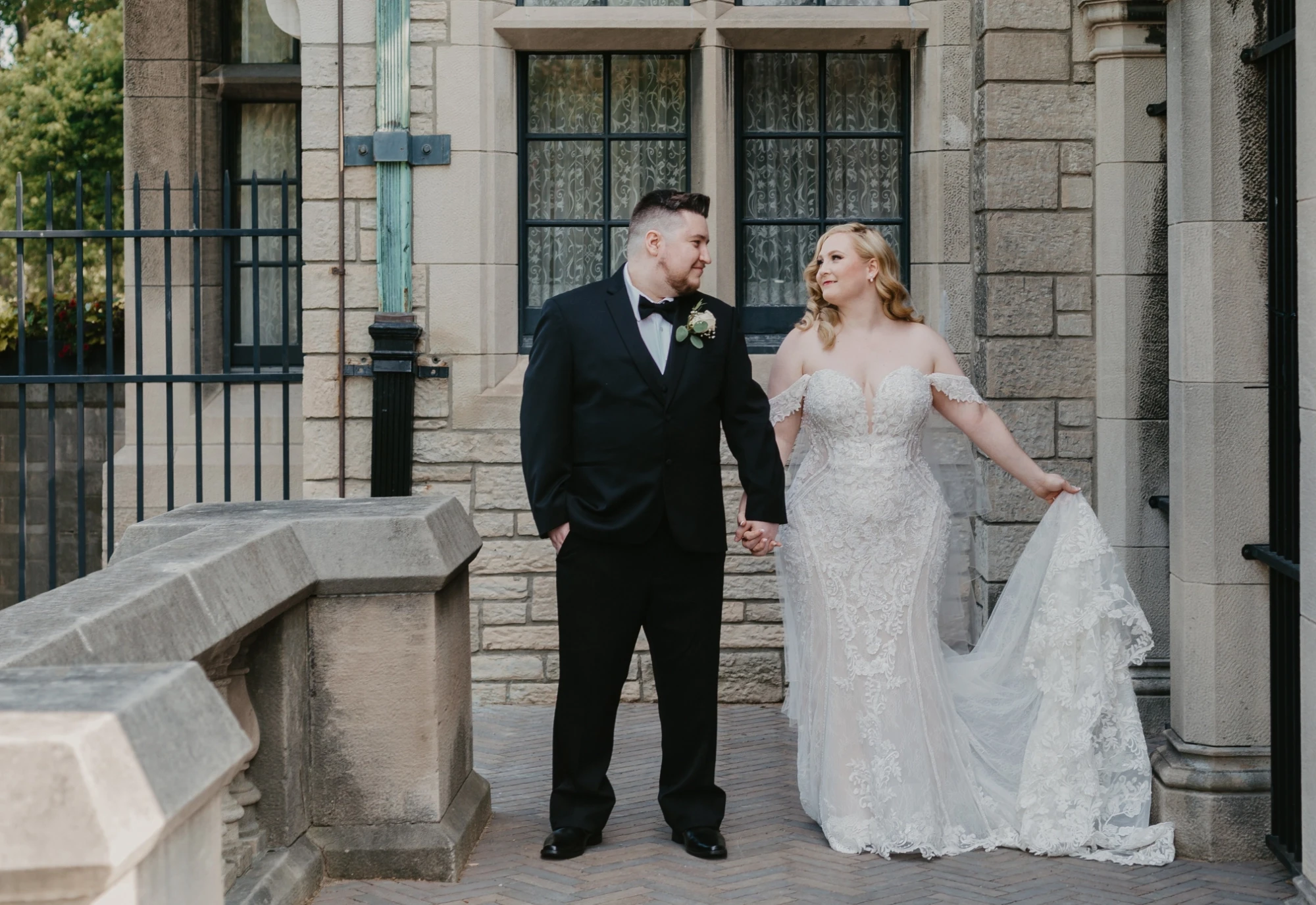 Photo of a plus-size bride in a white gown